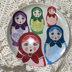 Large circular plastic multicolor Russian Matryoshka stacking doll serving plate